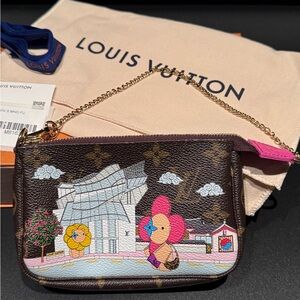 Brand NEW Louis Vuitton Vivienne Monogram Mini Pochette M81633